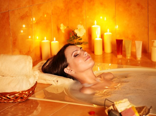 Woman take bubble  bath.