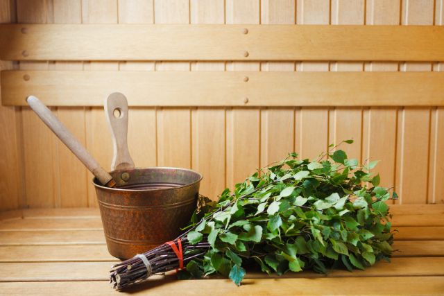 bunch of green birch twigs in sauna